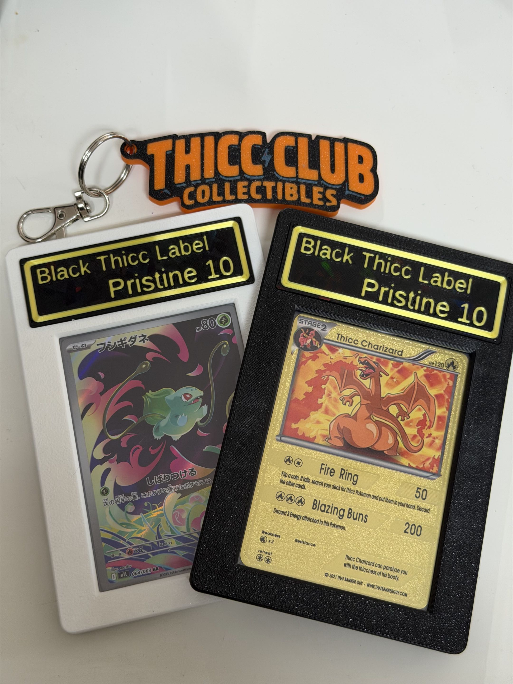 Thicc Club Prints risers and nameplates arranged for display